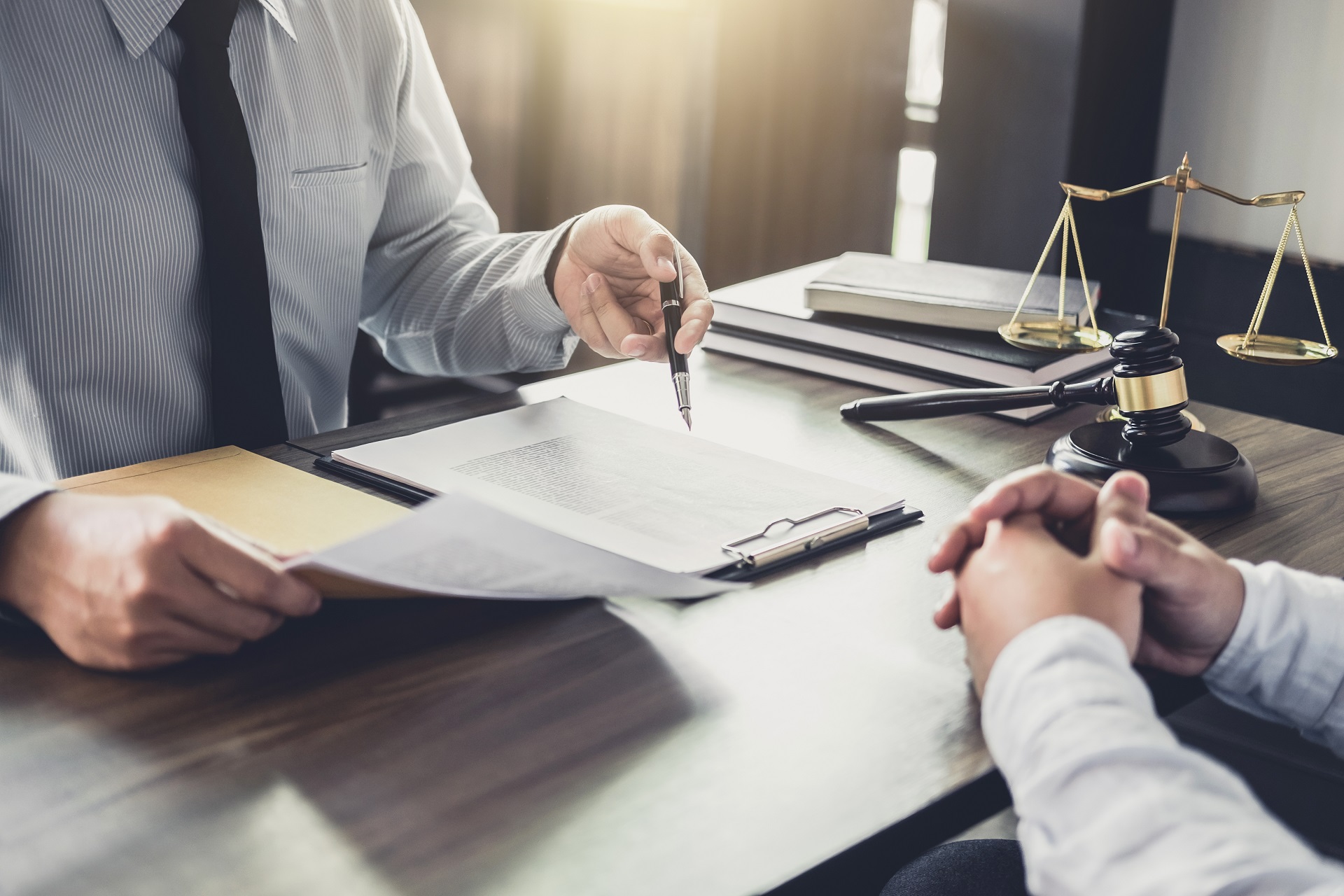 Customer service good cooperation, Consultation between a Busine Customer service good cooperation, Consultation between a Businessman and Male lawyer or judge consult having team meeting with client, Law and Legal services concept.